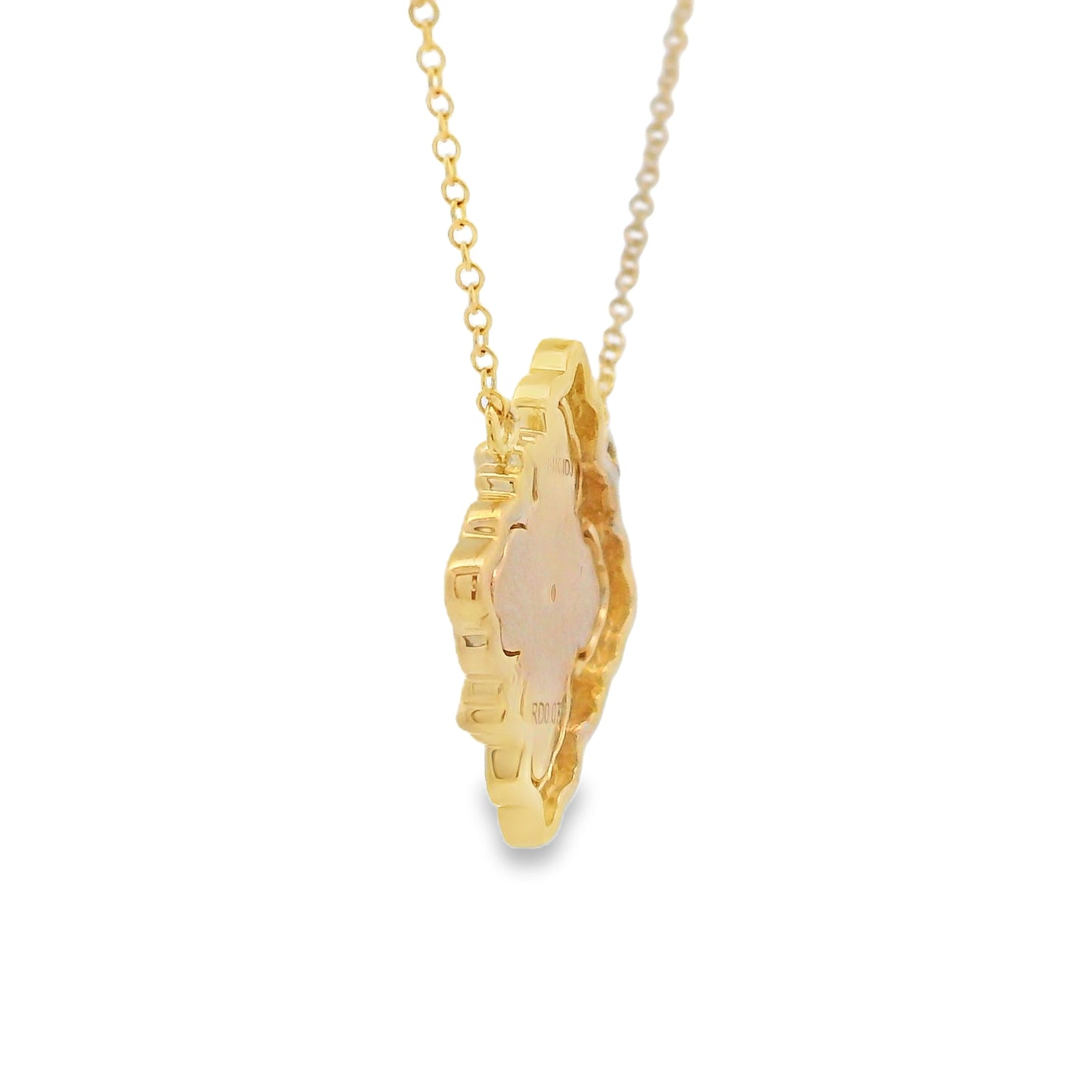 A gold chain necklace with a textured, irregularly shaped pendant featuring a pale pink inlay, shown against a plain white background.