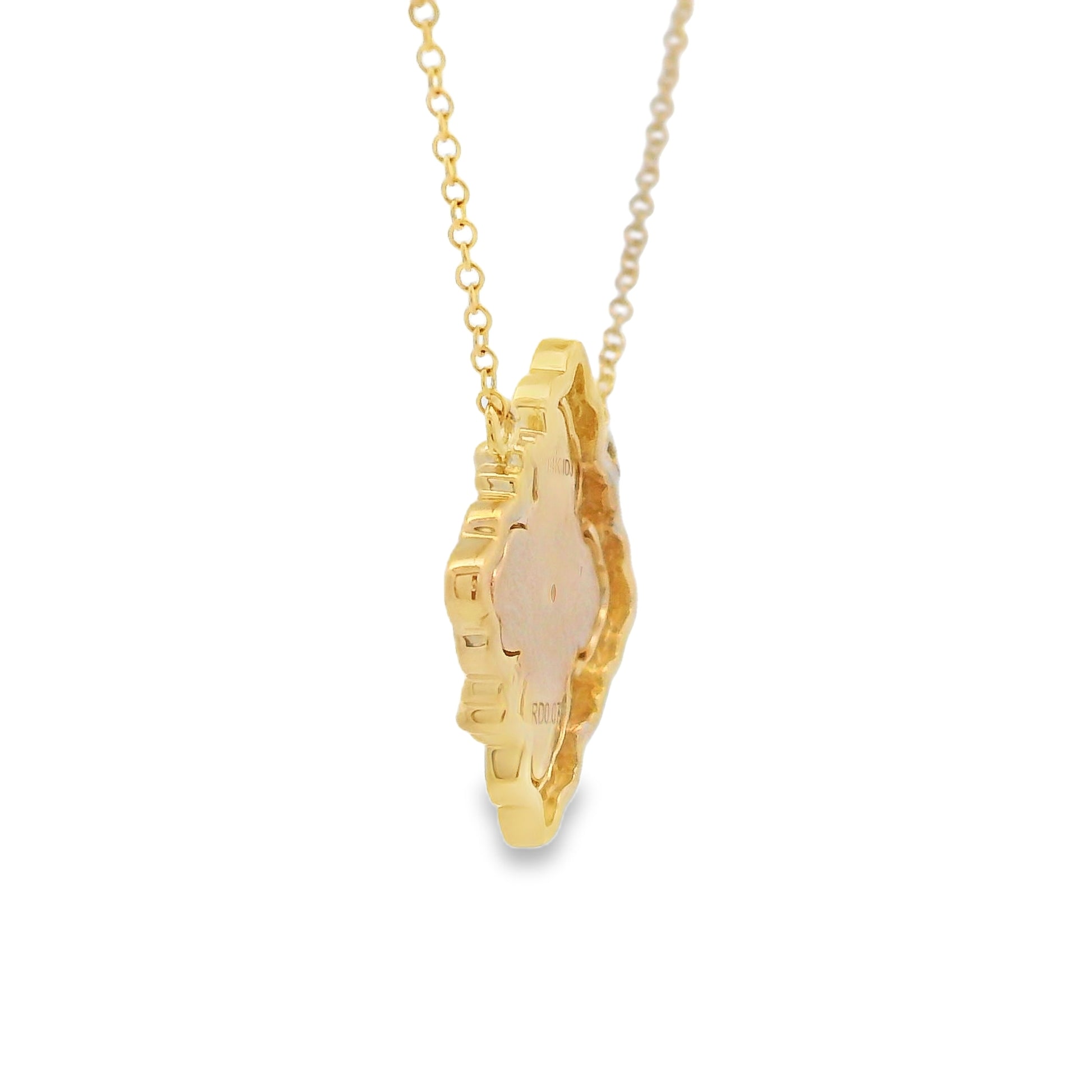 A gold chain necklace with a textured, irregularly shaped pendant featuring a pale pink inlay, shown against a plain white background.