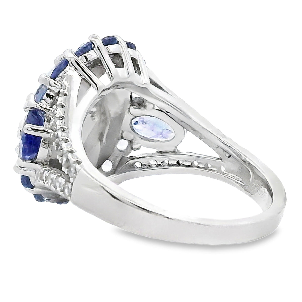 side view 12x10mm Ethiopian opal and tanzanite halo ring in sterling silver, top view of aqua-blue oval opal surrounded by violet-blue tanzanites
