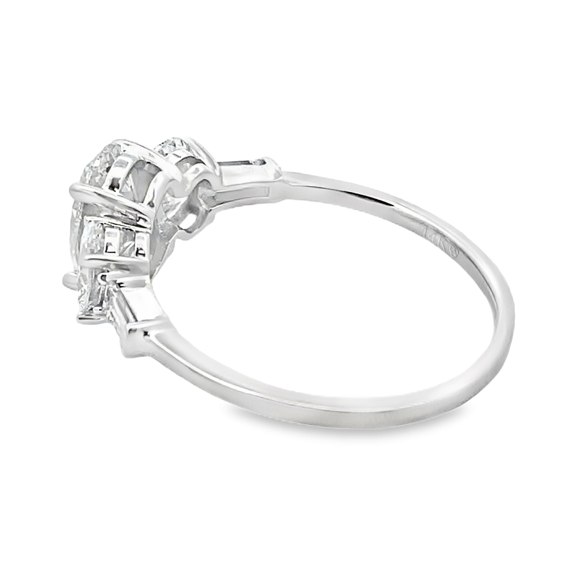 side view of three stone lab grown diamond ring