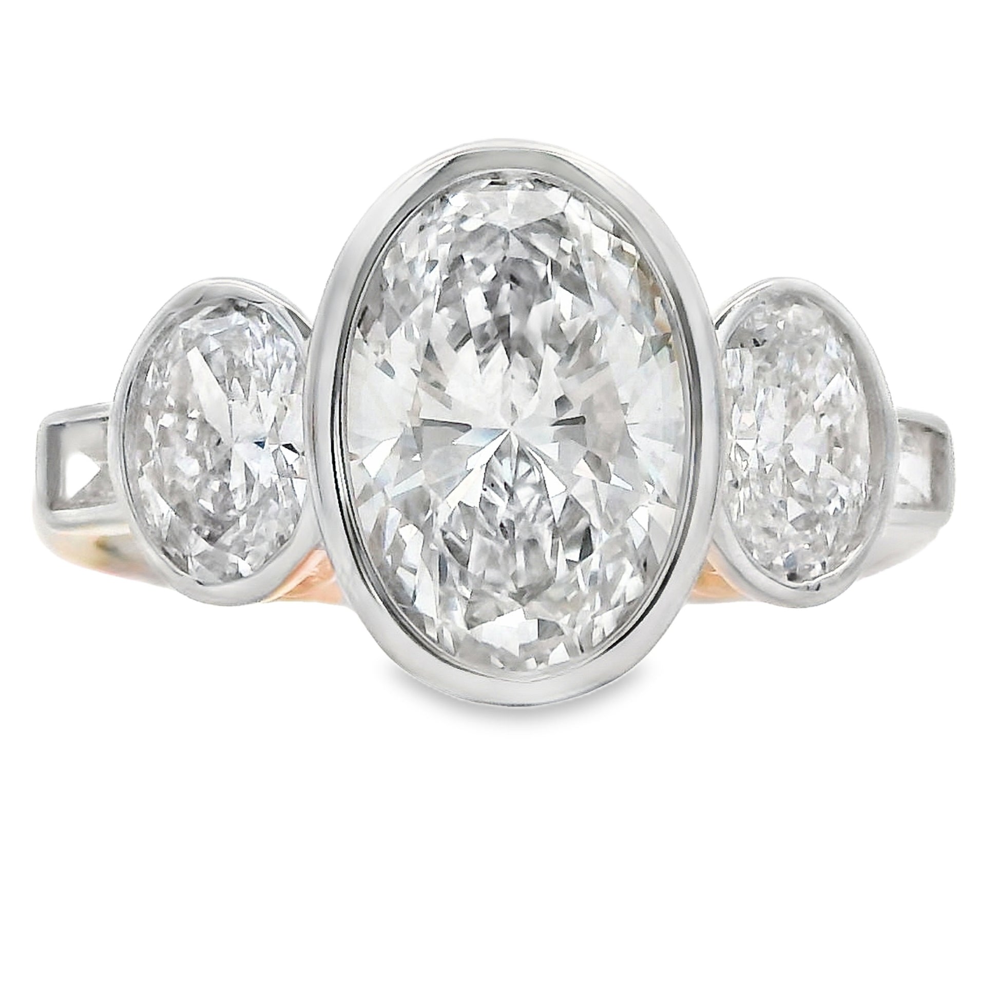 2.75ct Oval Lab Grown Diamond Three Stone Bezel Ring 14kt Yellow Gold